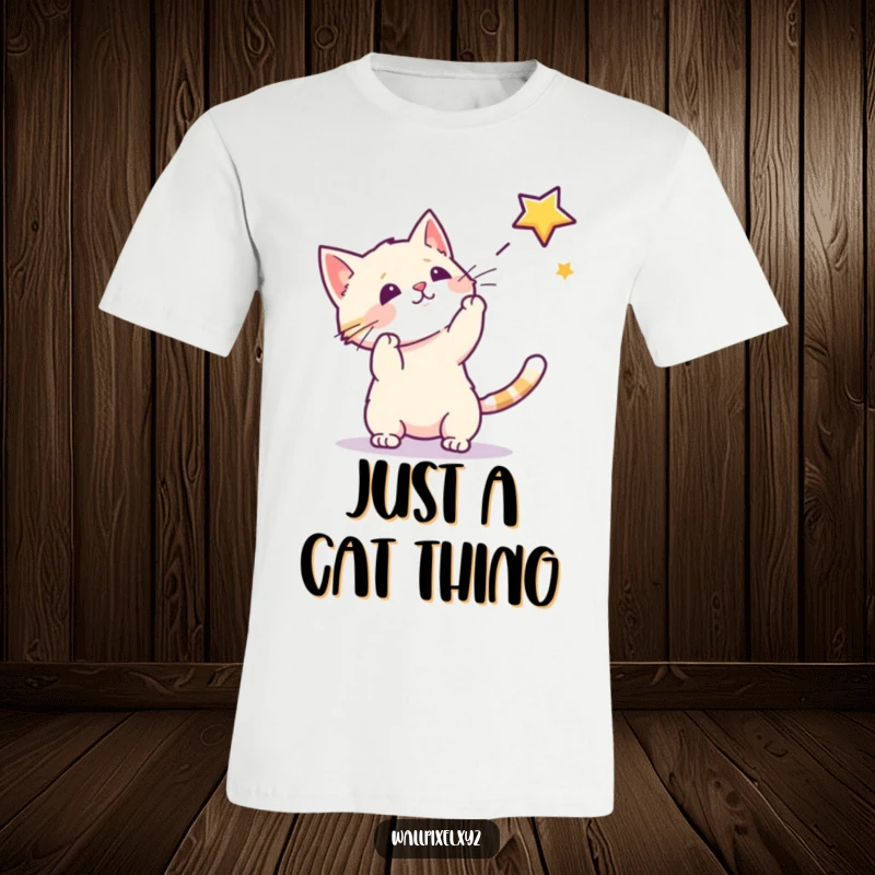 Funny t-shirt showcasing a pixel cat leaping to catch a floating pixel star, ideal for retro gaming enthusiasts and cat lovers.